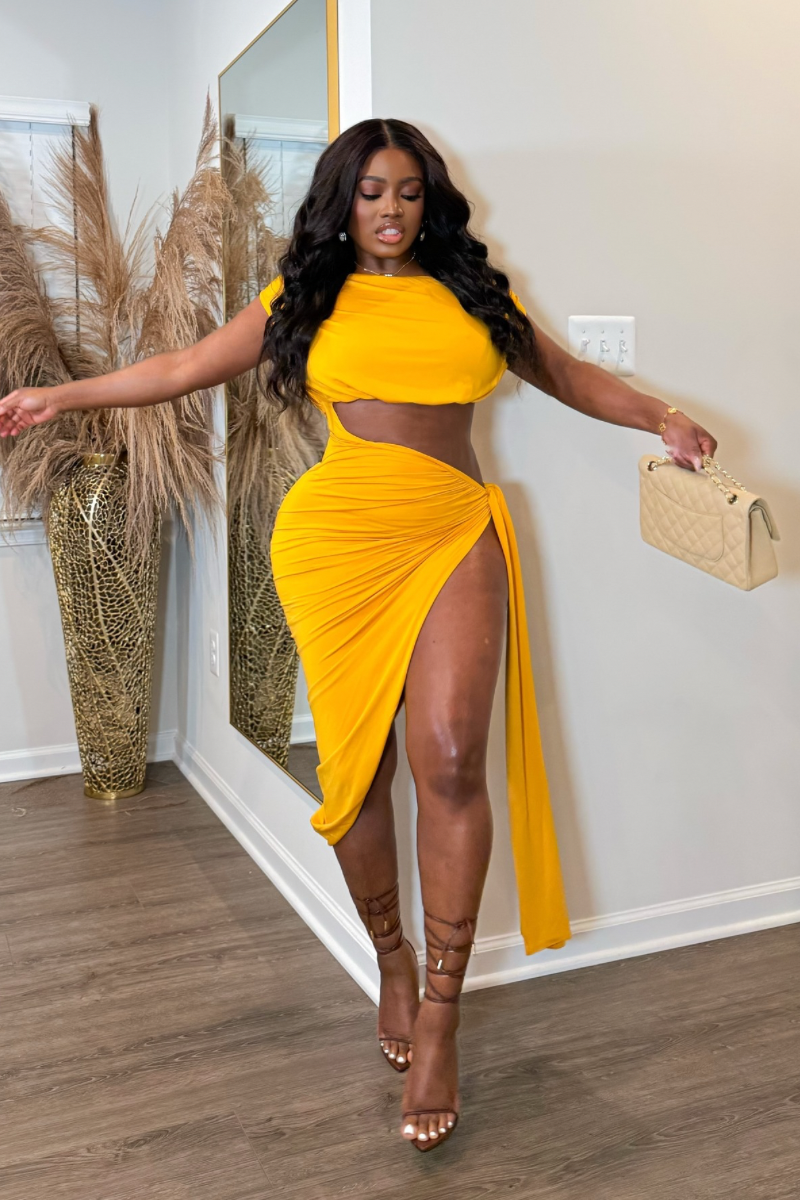 “OVERSEAS” CUTOUT DRESS