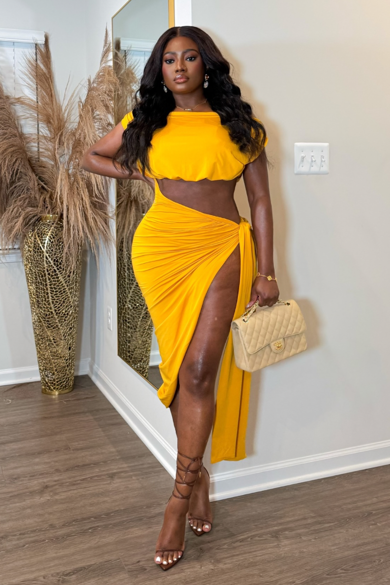 “OVERSEAS” CUTOUT DRESS