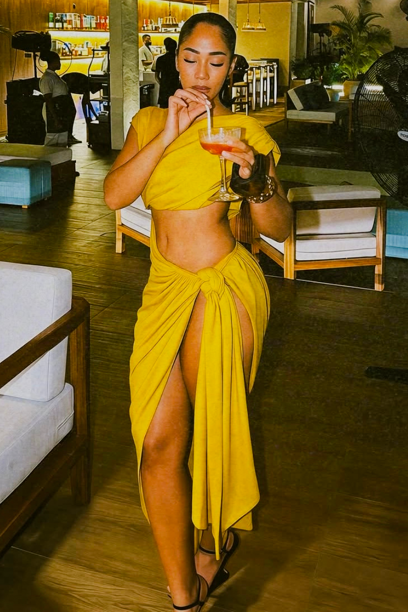 “OVERSEAS” CUTOUT DRESS