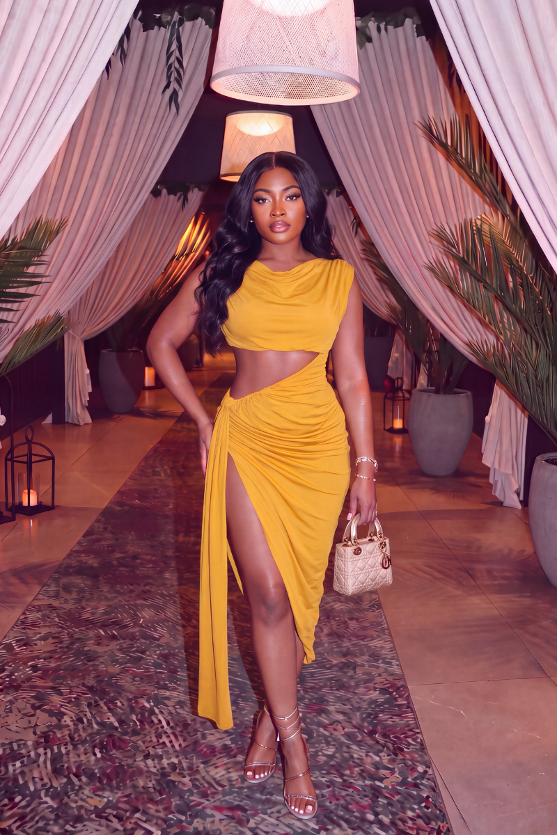 “OVERSEAS” CUTOUT DRESS