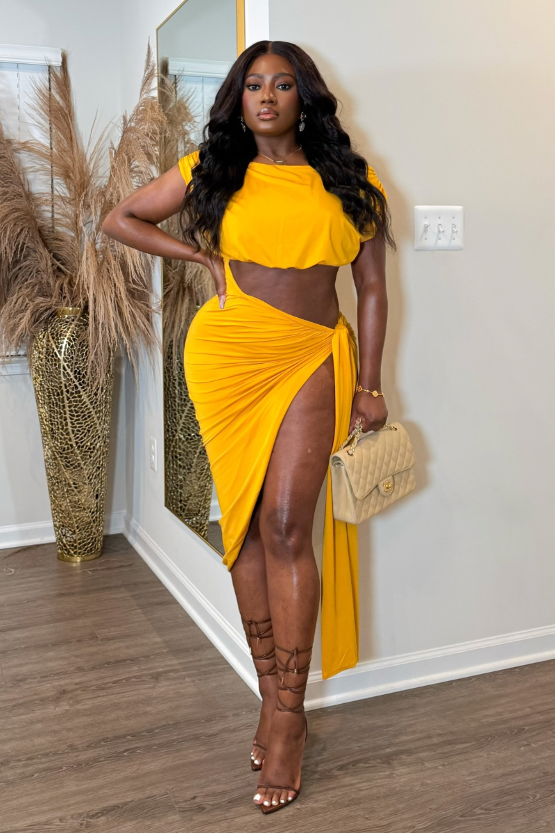 “OVERSEAS” CUTOUT DRESS