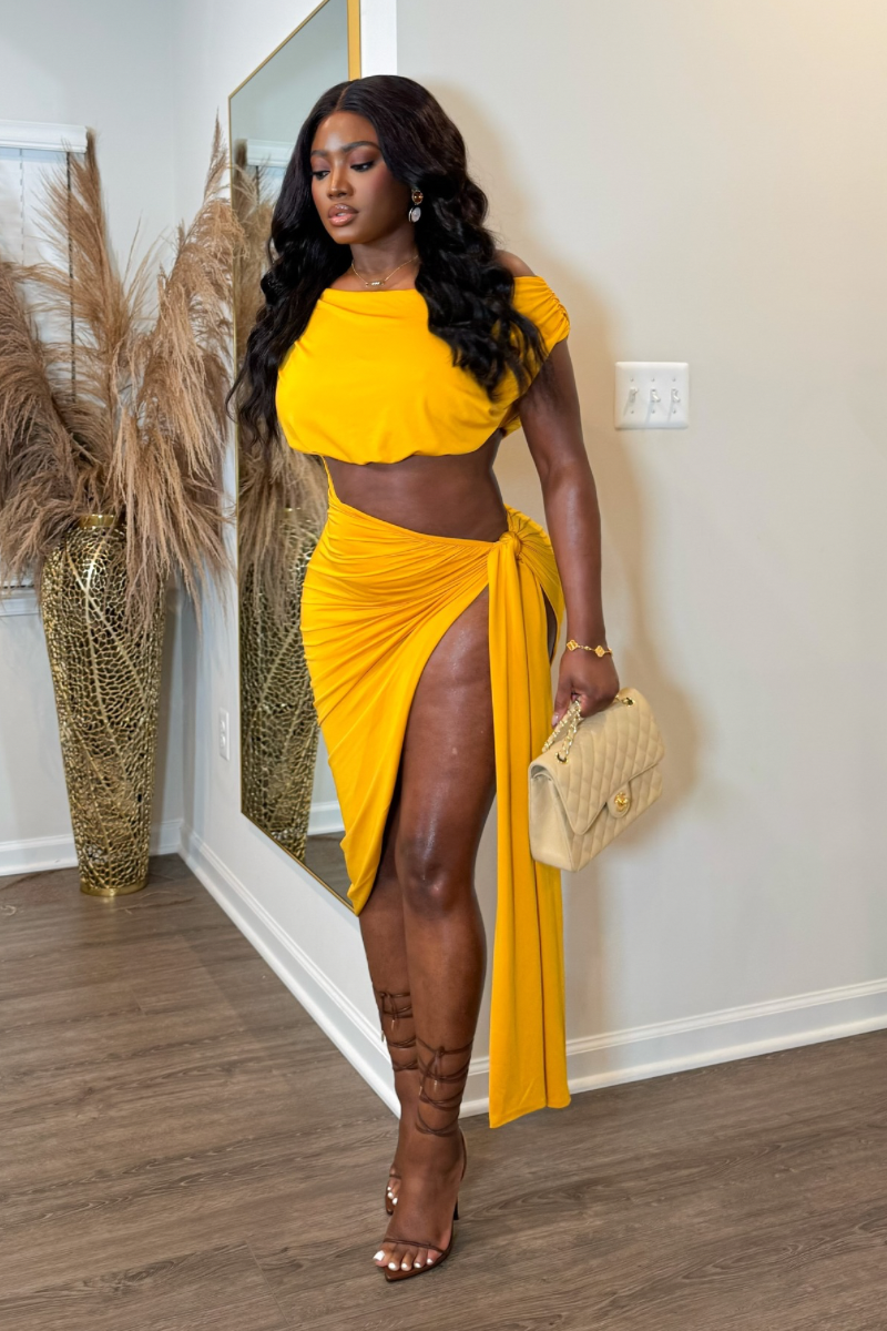 “OVERSEAS” CUTOUT DRESS